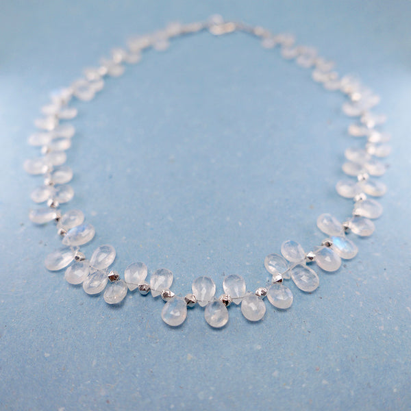Perspective view of silver beaded moonstone necklace.