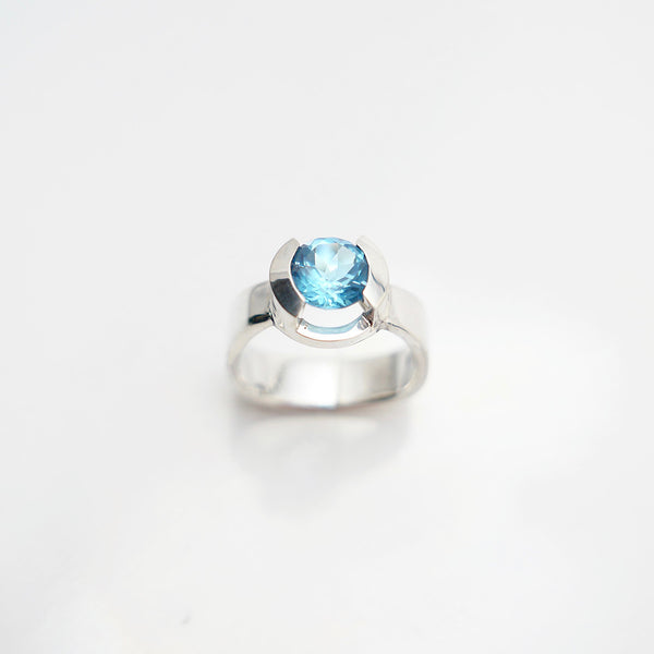 Top view of silver blue topaz gem ring, by Granville Island Silversmith.