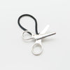 Close up of silver scissors hair tie by Granville Island Jeweler.