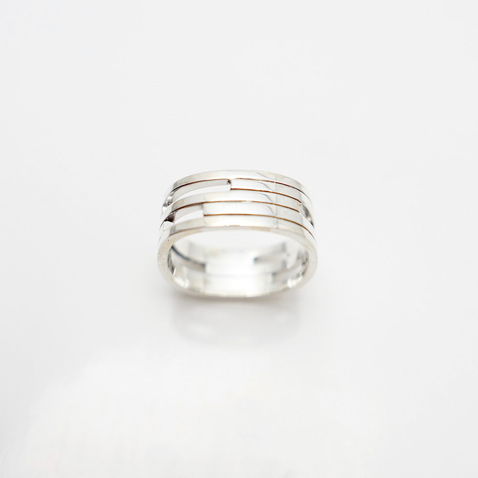 Close up top view of handmade silver Vancouver house ring.