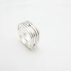 Angle view of silver handmade Vancouver house ring.